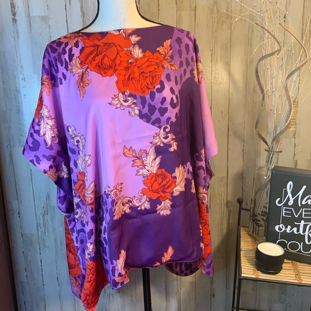 IMAN reversible global chic blouse. Size M/L